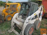 mini nakladalec bobcat in caterpilar